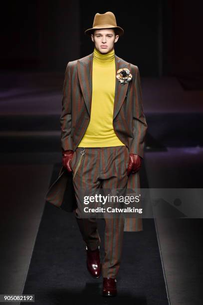 Model walks the runway at the Daks Autumn Winter 2018 fashion show during Milan Menswear Fashion Week on January 14, 2018 in Milan, Italy.