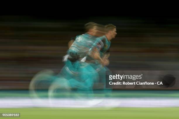 Brendan Doggett of the Heat runs in to bowl during the Big Bash League match between the Hobart Hurricanes and the Brisbane Heat at Blundstone Arena...