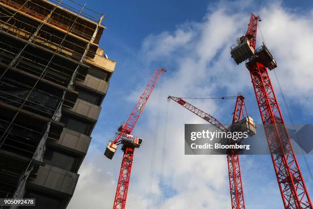 Cranes, with the logo of building contractor Carillion Plc, stand on a construction site in London, U.K., on Wednesday, Jan. 10, 2018. Carillion Plc,...