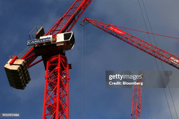 Crane, with the logo of building contractor Carillion Plc, stands on a construction site in London, U.K., on Wednesday, Jan. 10, 2018. Carillion Plc,...