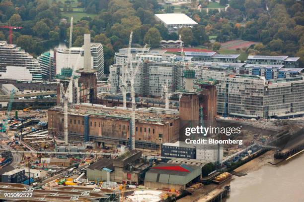 Construction cranes surround the Battersea Power Station office, retail and residential development in this aerial view taken over the Nine Elms...