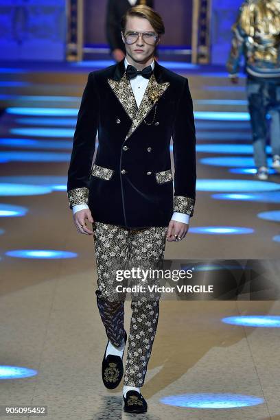 Model walks the runway at the Dolce & Gabbana show during Milan Men's Fashion Week Fall/Winter 2018/19 on January 13, 2018 in Milan, Italy.