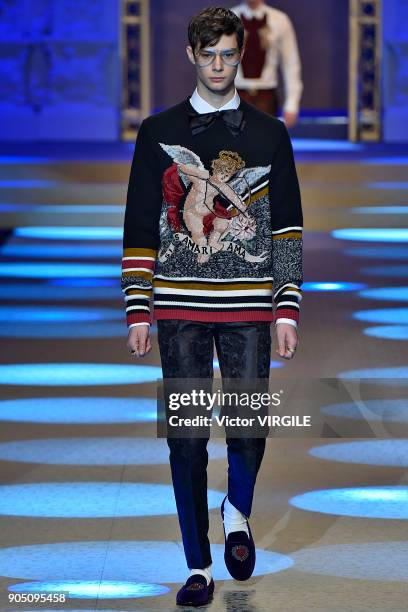 Model walks the runway at the Dolce & Gabbana show during Milan Men's Fashion Week Fall/Winter 2018/19 on January 13, 2018 in Milan, Italy.