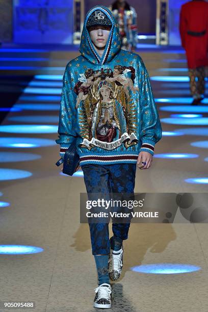 Model walks the runway at the Dolce & Gabbana show during Milan Men's Fashion Week Fall/Winter 2018/19 on January 13, 2018 in Milan, Italy.