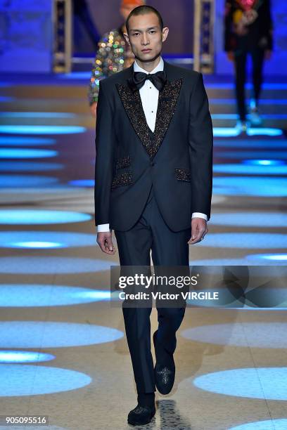 Model walks the runway at the Dolce & Gabbana show during Milan Men's Fashion Week Fall/Winter 2018/19 on January 13, 2018 in Milan, Italy.