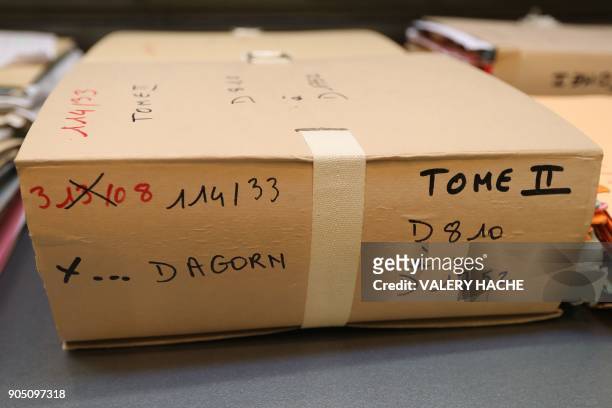 Files in the case of Patricia Dagorn, a woman suspected of being a serial poisoner trapping wealthy widowers from the Cote d'Azur, are pictured prior...