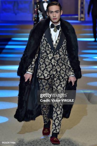 Model walks the runway at the Dolce & Gabbana show during Milan Men's Fashion Week Fall/Winter 2018/19 on January 13, 2018 in Milan, Italy.