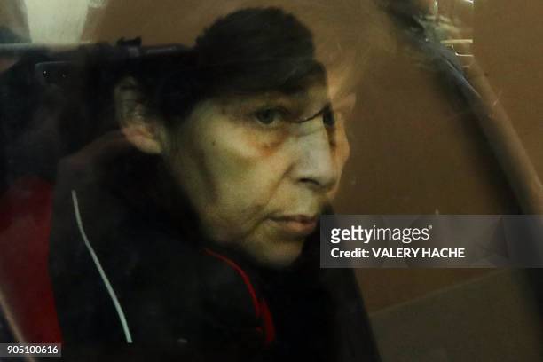Patricia Dagorn, a woman suspected of being a serial poisoner trapping wealthy widowers from the Cote d'Azur, is seen in a car as she arrives at the...