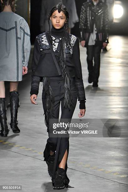 Model walks the runway at the Diesel Black Gold show during Milan Men's Fashion Week Fall/Winter 2018/19 on January 13, 2018 in Milan, Italy.