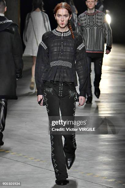 Model walks the runway at the Diesel Black Gold show during Milan Men's Fashion Week Fall/Winter 2018/19 on January 13, 2018 in Milan, Italy.