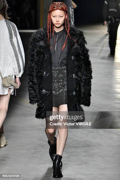 Model walks the runway at the Diesel Black Gold show during Milan Men's Fashion Week Fall/Winter 2018/19 on January 13, 2018 in Milan, Italy.