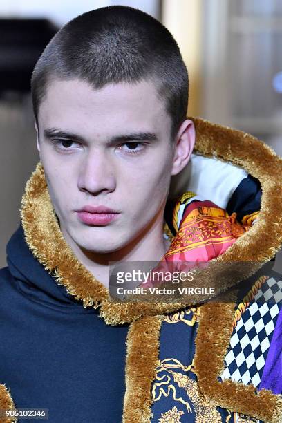 Model walks the runway at the Versace show during Milan Men's Fashion Week Fall/Winter 2018/19 on January 13, 2018 in Milan, Italy.