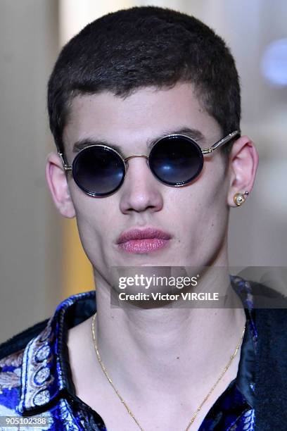 Model walks the runway at the Versace show during Milan Men's Fashion Week Fall/Winter 2018/19 on January 13, 2018 in Milan, Italy.