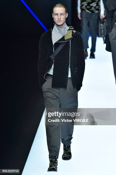 Model walks the runway at the Emporio Armani show during Milan Men's Fashion Week Fall/Winter 2018/19 on January 13, 2018 in Milan, Italy.