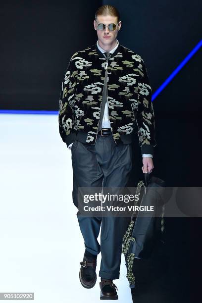 Model walks the runway at the Emporio Armani show during Milan Men's Fashion Week Fall/Winter 2018/19 on January 13, 2018 in Milan, Italy.