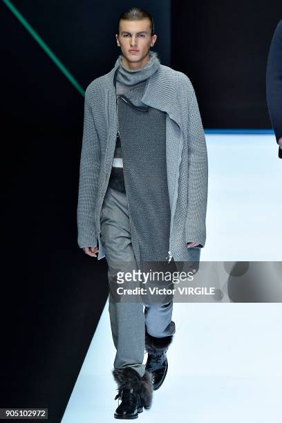 Model walks the runway at the Emporio Armani show during Milan Men's Fashion Week Fall/Winter 2018/19 on January 13, 2018 in Milan, Italy.