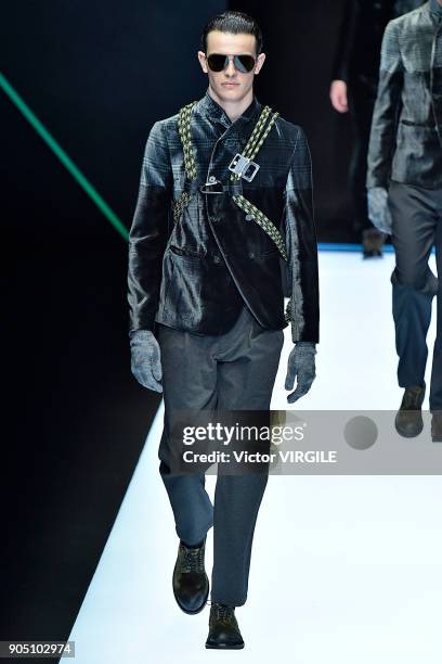 Model walks the runway at the Emporio Armani show during Milan Men's Fashion Week Fall/Winter 2018/19 on January 13, 2018 in Milan, Italy.