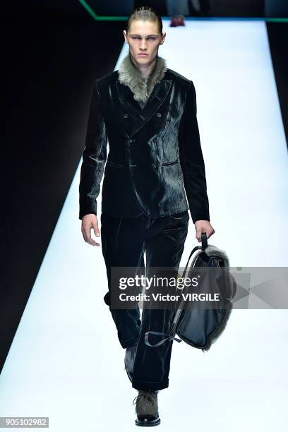 Model walks the runway at the Emporio Armani show during Milan Men's Fashion Week Fall/Winter 2018/19 on January 13, 2018 in Milan, Italy.