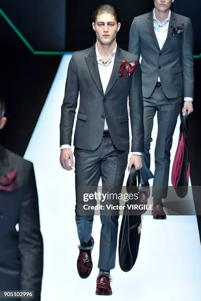 Model walks the runway at the Emporio Armani show during Milan Men's Fashion Week Fall/Winter 2018/19 on January 13, 2018 in Milan, Italy.