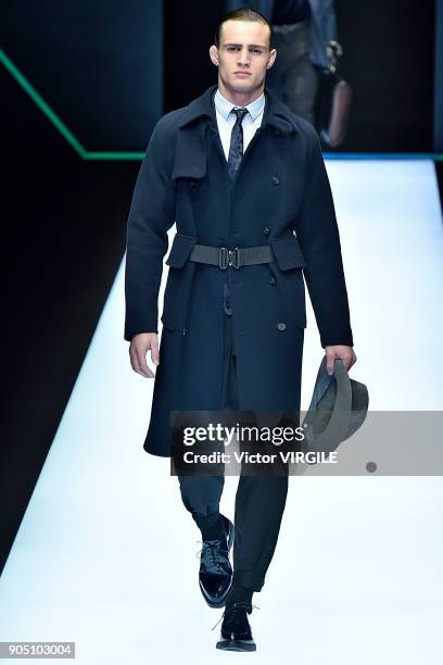 Model walks the runway at the Emporio Armani show during Milan Men's Fashion Week Fall/Winter 2018/19 on January 13, 2018 in Milan, Italy.