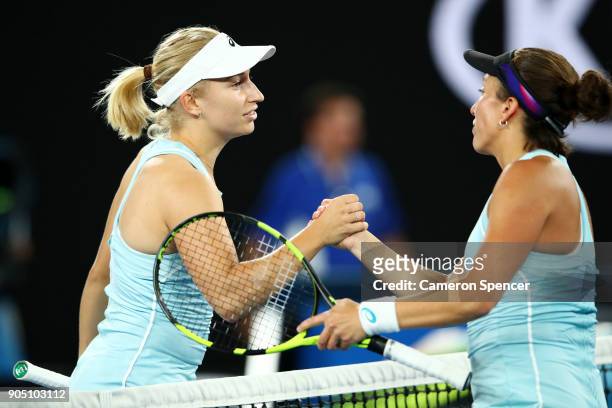 Daria Gavrilova of Australia shakes hands with Francesca Schiavone of Italy after winning their round one match on day one of the 2018 Australian...