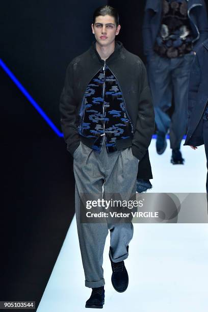 Model walks the runway at the Emporio Armani show during Milan Men's Fashion Week Fall/Winter 2018/19 on January 13, 2018 in Milan, Italy.