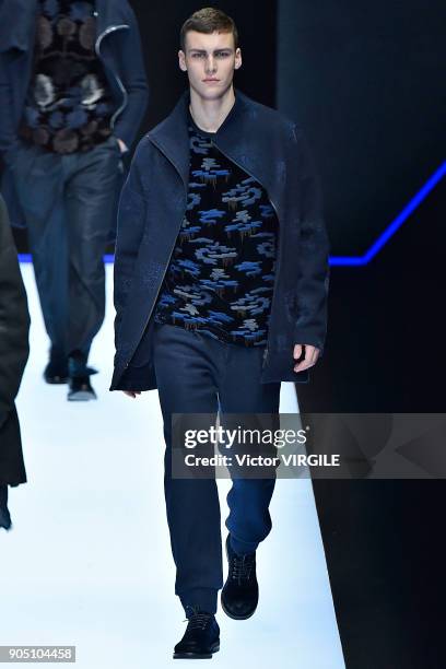 Model walks the runway at the Emporio Armani show during Milan Men's Fashion Week Fall/Winter 2018/19 on January 13, 2018 in Milan, Italy.