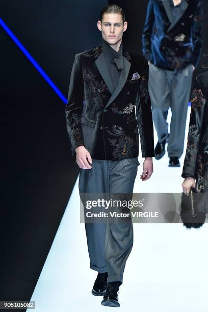 Model walks the runway at the Emporio Armani show during Milan Men's Fashion Week Fall/Winter 2018/19 on January 13, 2018 in Milan, Italy.