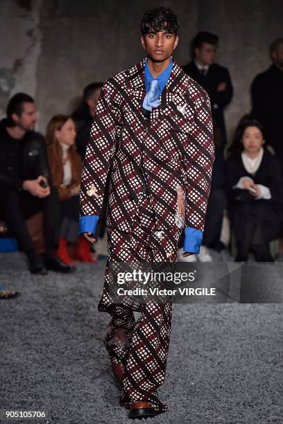 Model walks the runway at the Marni show during Milan Men's Fashion Week Fall/Winter 2018/19 on January 13, 2018 in Milan, Italy.