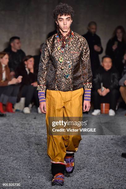 Model walks the runway at the Marni show during Milan Men's Fashion Week Fall/Winter 2018/19 on January 13, 2018 in Milan, Italy.