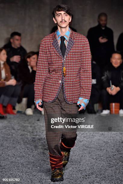 Model walks the runway at the Marni show during Milan Men's Fashion Week Fall/Winter 2018/19 on January 13, 2018 in Milan, Italy.