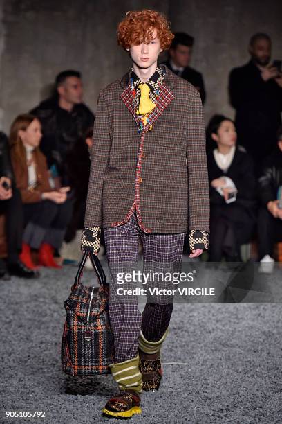 Model walks the runway at the Marni show during Milan Men's Fashion Week Fall/Winter 2018/19 on January 13, 2018 in Milan, Italy.