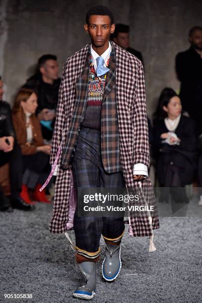 Model walks the runway at the Marni show during Milan Men's Fashion Week Fall/Winter 2018/19 on January 13, 2018 in Milan, Italy.