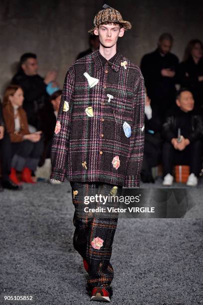 Model walks the runway at the Marni show during Milan Men's Fashion Week Fall/Winter 2018/19 on January 13, 2018 in Milan, Italy.