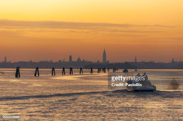 monochrome, the colors of dawn in the venice lagoon - monochrome 700063863 stock pictures, royalty-free photos & images
