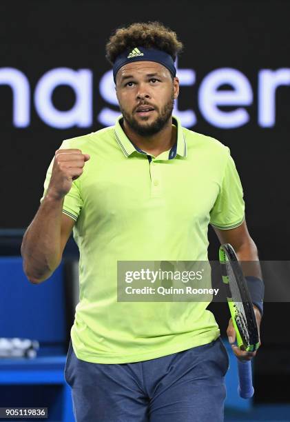Jo-Wilfried Tsonga of France celebrates winning a point in his first round match against Kevin King of the United States on day one of the 2018...