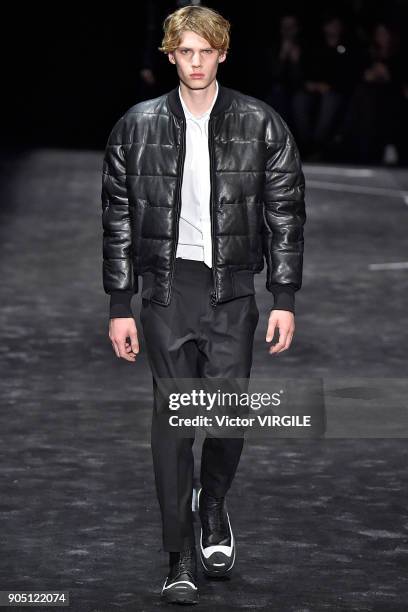 Model walks the runway at the Neil Barrett show during Milan Men's Fashion Week Fall/Winter 2018/19 on January 13, 2018 in Milan, Italy.