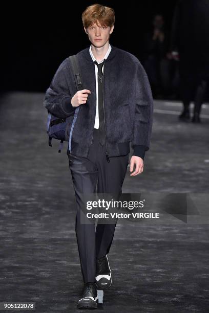 Model walks the runway at the Neil Barrett show during Milan Men's Fashion Week Fall/Winter 2018/19 on January 13, 2018 in Milan, Italy.