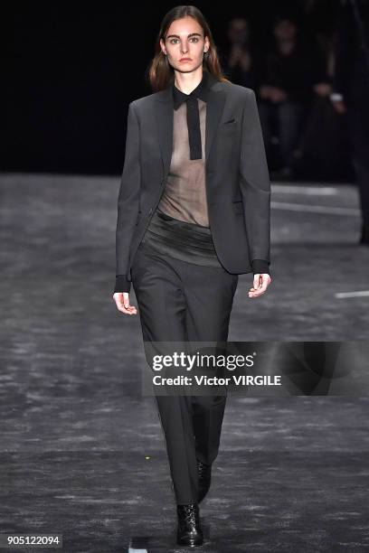 Model walks the runway at the Neil Barrett show during Milan Men's Fashion Week Fall/Winter 2018/19 on January 13, 2018 in Milan, Italy.