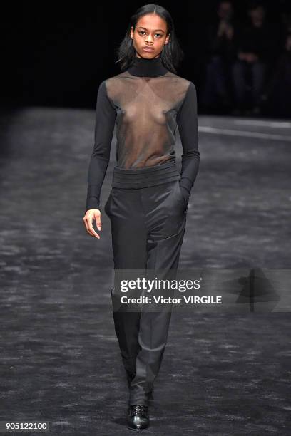 Model walks the runway at the Neil Barrett show during Milan Men's Fashion Week Fall/Winter 2018/19 on January 13, 2018 in Milan, Italy.