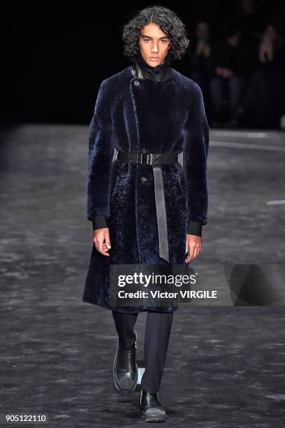 Model walks the runway at the Neil Barrett show during Milan Men's Fashion Week Fall/Winter 2018/19 on January 13, 2018 in Milan, Italy.