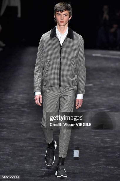 Model walks the runway at the Neil Barrett show during Milan Men's Fashion Week Fall/Winter 2018/19 on January 13, 2018 in Milan, Italy.