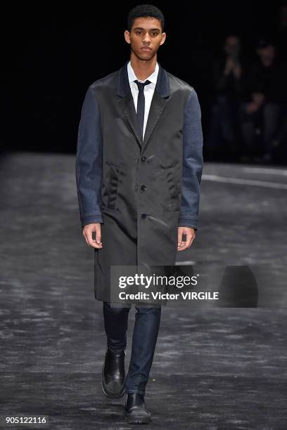 Model walks the runway at the Neil Barrett show during Milan Men's Fashion Week Fall/Winter 2018/19 on January 13, 2018 in Milan, Italy.