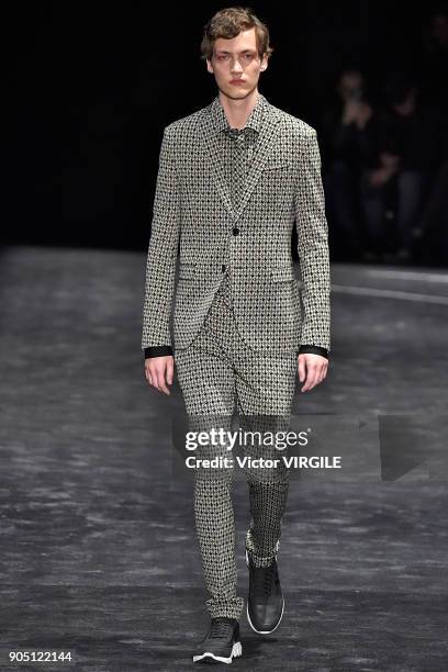 Model walks the runway at the Neil Barrett show during Milan Men's Fashion Week Fall/Winter 2018/19 on January 13, 2018 in Milan, Italy.