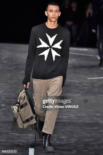 Model walks the runway at the Neil Barrett show during Milan Men's Fashion Week Fall/Winter 2018/19 on January 13, 2018 in Milan, Italy.