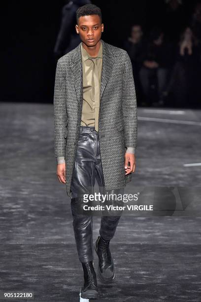 Model walks the runway at the Neil Barrett show during Milan Men's Fashion Week Fall/Winter 2018/19 on January 13, 2018 in Milan, Italy.