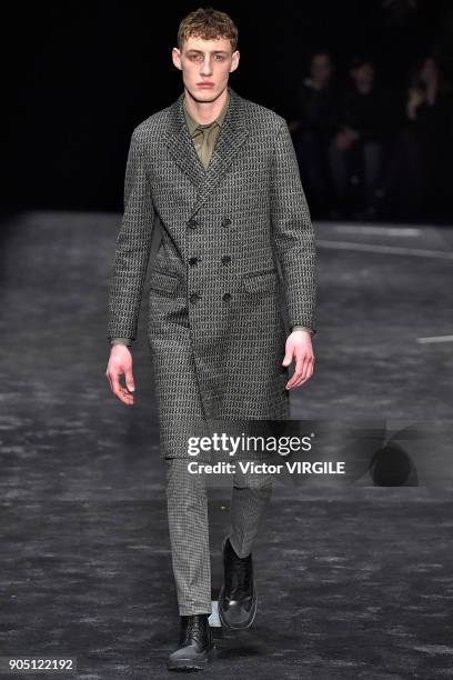 Model walks the runway at the Neil Barrett show during Milan Men's Fashion Week Fall/Winter 2018/19 on January 13, 2018 in Milan, Italy.