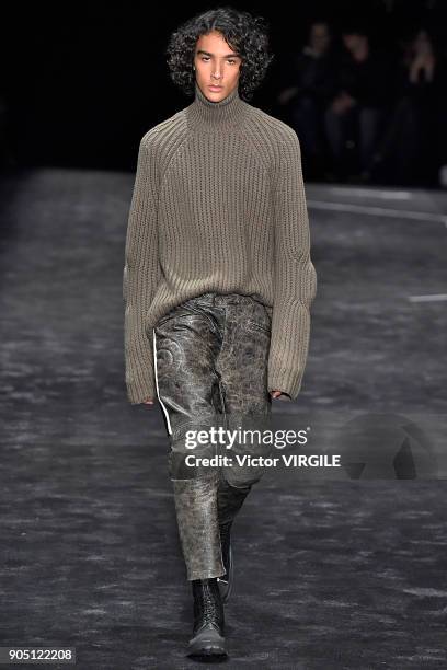 Model walks the runway at the Neil Barrett show during Milan Men's Fashion Week Fall/Winter 2018/19 on January 13, 2018 in Milan, Italy.