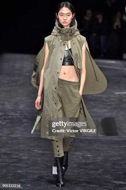 Model walks the runway at the Neil Barrett show during Milan Men's Fashion Week Fall/Winter 2018/19 on January 13, 2018 in Milan, Italy.