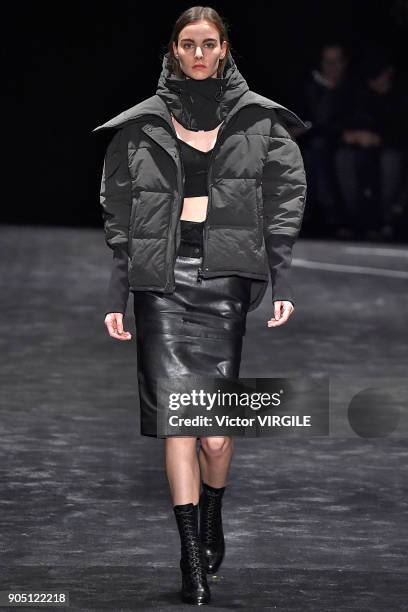 Model walks the runway at the Neil Barrett show during Milan Men's Fashion Week Fall/Winter 2018/19 on January 13, 2018 in Milan, Italy.